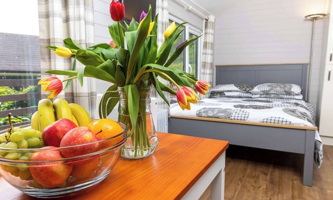 Berrynarbor Chalet De Esquí | Unique, peaceful, cosy and quaint cedar wood built holiday lodge.
