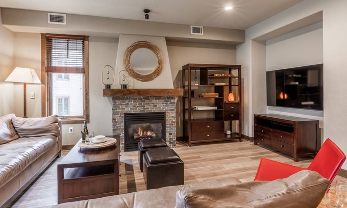 Woodwinds Casa | Updated Woodwinds Townhome! Walk to the Village! 2 Car Garage! 2 Decks!