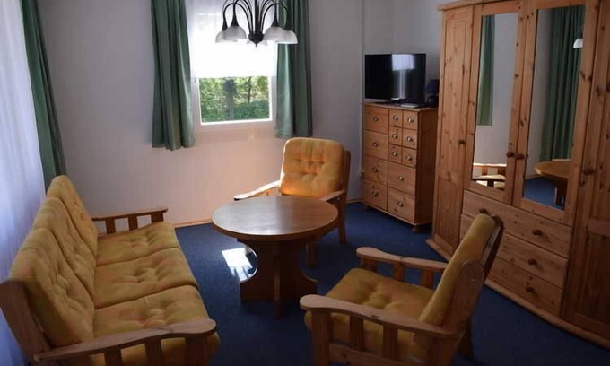 Quetzin Casa | Casa de campo con bote de remos - 2 casas de campo en el lago Plauer (para 4 pers.) Con bote de remos