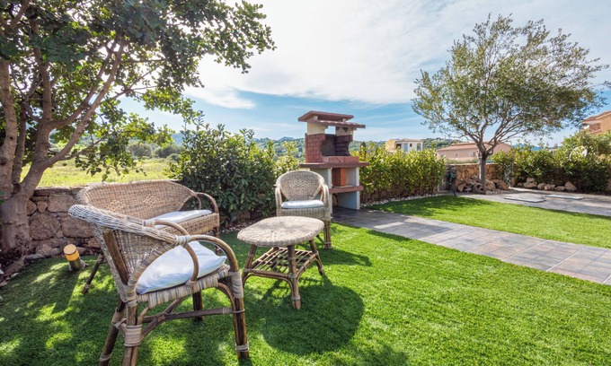Budoni Casa | Casa de vacaciones "Casa a Schiera Budoni" con terraza y jardín