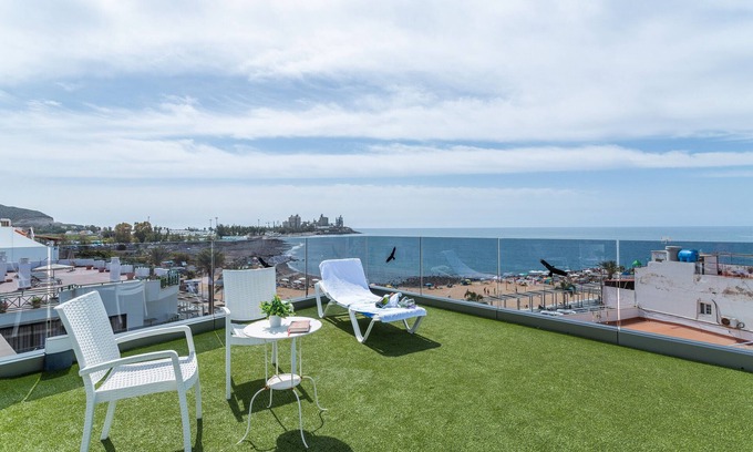 Arguineguin Casa | Casa de vacaciones 'Sunset' con vistas al mar, terraza compartida y Wi-Fi