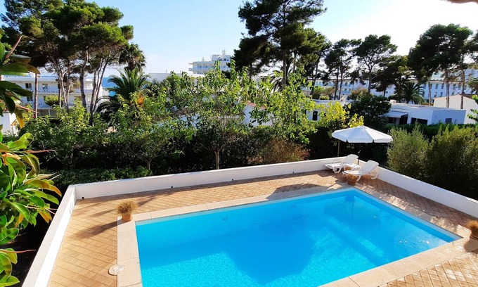 Es Migjorn Gran Villa | Villa con piscina y vistas al Mar en la Playa de Santo Tomas