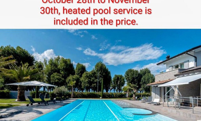 San Benedetto di Lugana Villa | Villa "Sirmione frente al lago" con vistas al lago, piscina privada climatizada y Wi-Fi