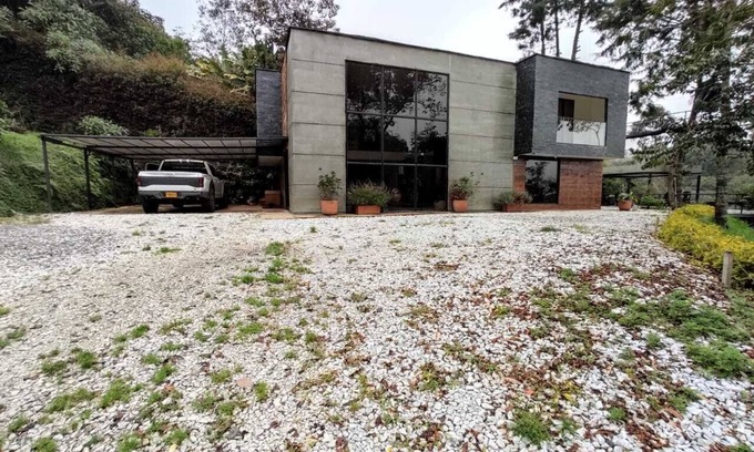 Los Nomos Villa | Villa verde con jacuzzi y malla catamarán
