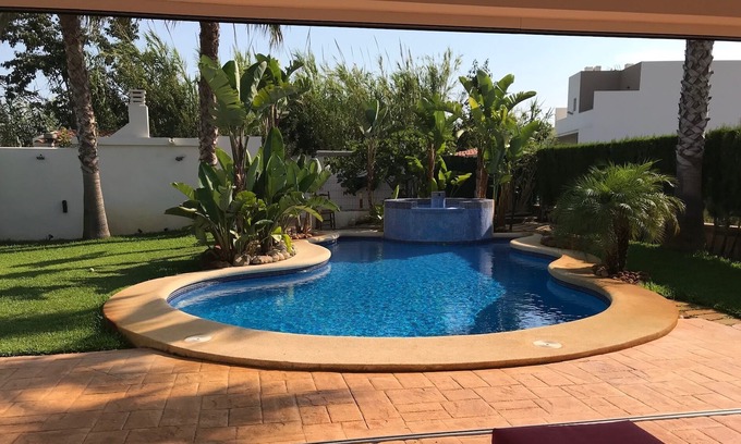 Oliva Villa | villa con piscina privada a 200 metros de la playa de arena
