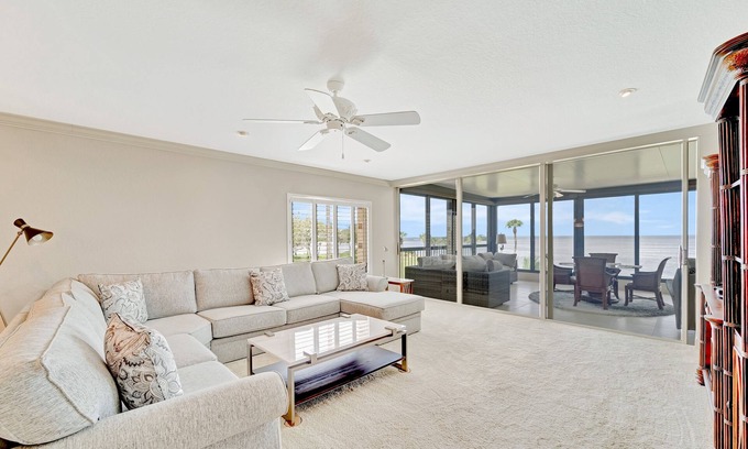 Burnt Store Marina Condominio | Waterfront condo with gorgeous view, enclosed lanai, W/D, WiFi & community pool