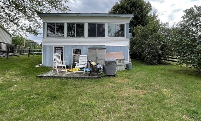 Raymond Cabina | WATERFRONT COTTAGE ON SEBAGO LAKE