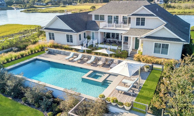 Quogue Casa | Waterfront Estate in Quogue with Private Dock, Pool & Resort-Style Grounds