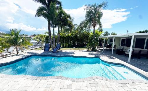 Flor-a-mar Casa | Waterfront Getaway with Pool, Dock & Kayaks
