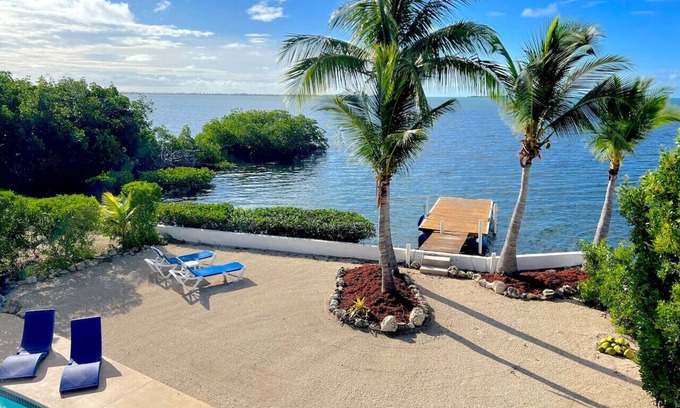 Cudjoe Key Casa | Frente al agua, atraque privado para botes, piscina privada climatizada.