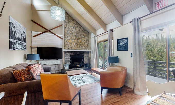 Fish Camp Casa | Wilderness upgraded duplex with wood fireplace, balcony, & shared EV charger