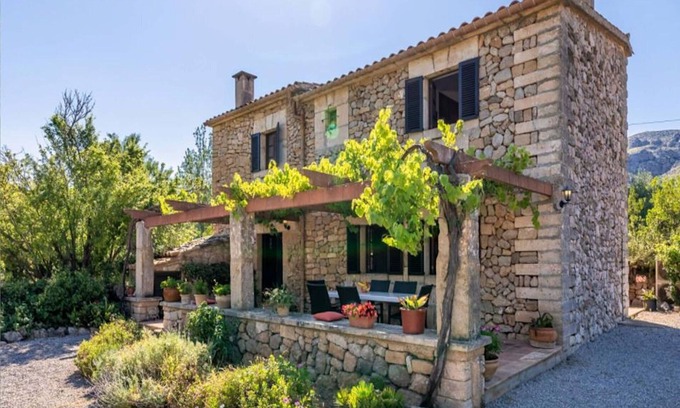 Urbanitzacio la Font Villa | Endearing Mallorca Villa | Villa Olympe | 5 Bedrooms | Spacious Furnished Sun Terrace | Private Outdoor Heated Pool | Salt Water Pool | BBQ Facilities | Shaded Outdoor Dining Area | Private Garden | Pollensa