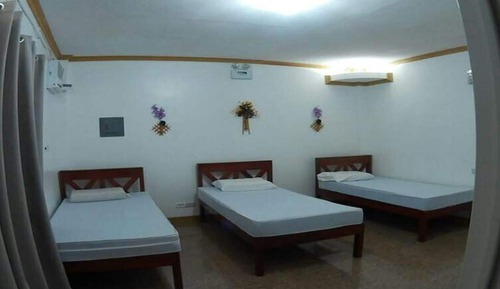 Habitación triple, vistas al jardín