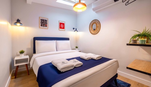 Habitación Grand, varias camas, vistas a la ciudad