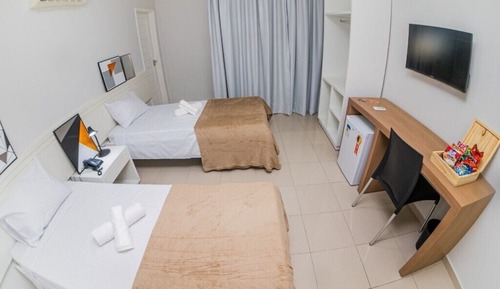 Habitación superior con 2 camas individuales, 1 cama doble