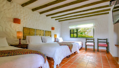 Habitación superior, varias camas