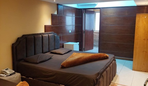 Habitación Signature con 1 cama doble o 2 individuales, 2 camas dobles