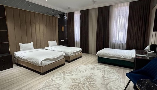 Habitación triple de lujo