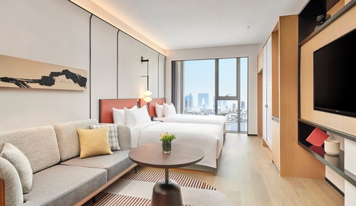 Habitación básica con 2 camas individuales