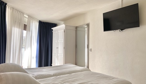 Habitación estándar con 2 camas individuales, baño compartido