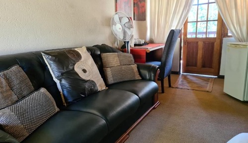 Habitación cuádruple ejecutiva, varias camas, balcón, vistas al jardín