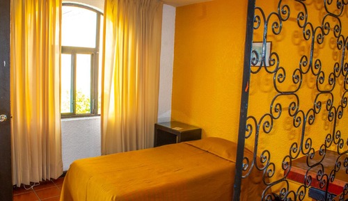 Habitación familiar, varias camas