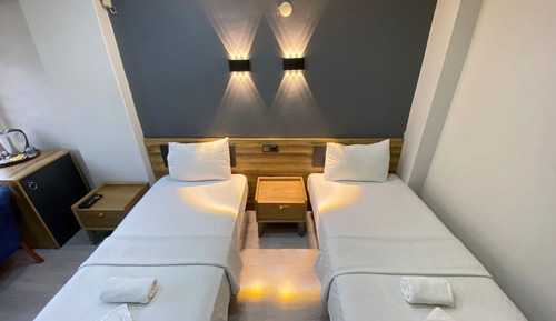 Habitación estándar con 1 cama doble o 2 individuales