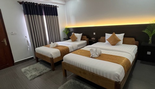 Habitación básica con 2 camas individuales