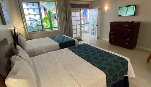 Habitación estándar, 2 camas dobles, junto a la playa
