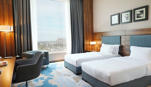 Habitación superior con 2 camas individuales, vistas al mar