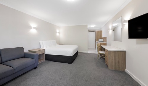 Habitación superior con 2 camas individuales, varias camas