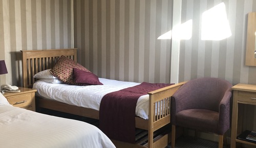 Habitación clásica con 2 camas individuales