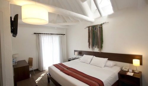 Habitación superior con 1 cama doble o 2 individuales