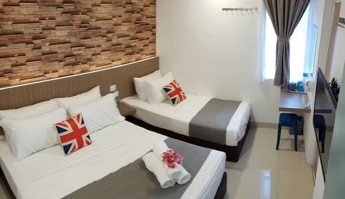 Habitación triple Deluxe