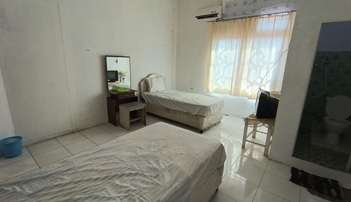 Habitación con 2 camas individuales