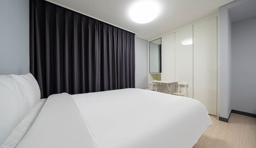 Habitación familiar con 2 camas individuales