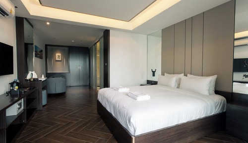 Suite ejecutiva, 1 cama de matrimonio grande, vistas a la ciudad