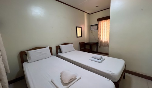 Habitación con 2 camas individuales