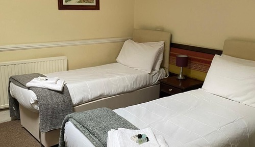 Habitación con 2 camas individuales