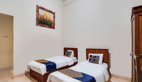 Habitación con 2 camas individuales