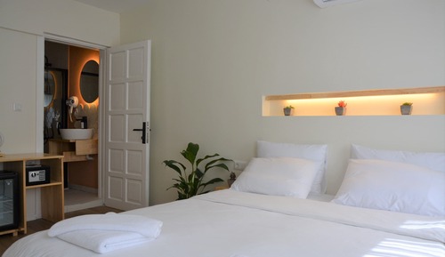 Habitación Confort con 1 cama doble o 2 individuales