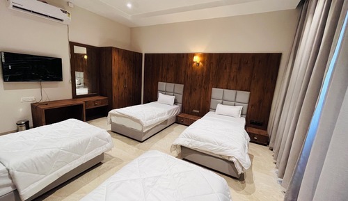 Habitación cuádruple familiar, fumadores, vistas al jardín