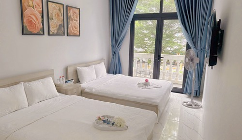 Habitación básica doble, 2 camas de matrimonio, vistas a la ciudad