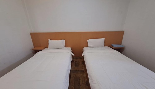 Habitación con 2 camas individuales