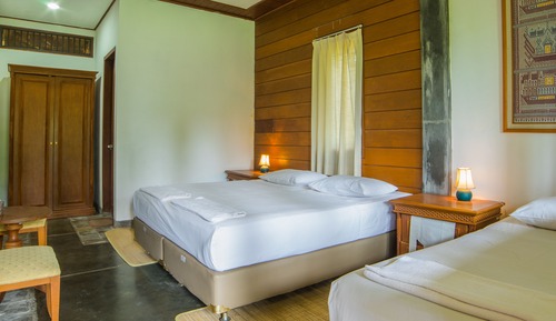 Habitación triple familiar, vistas al jardín
