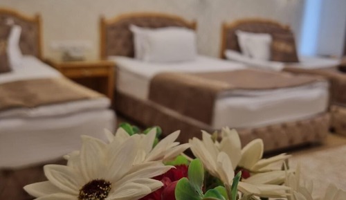 Habitación triple estándar, vistas al patio