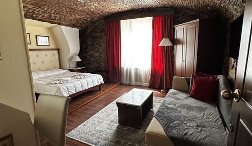 Habitación triple, vistas al mar