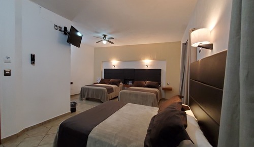 Habitación familiar, varias camas