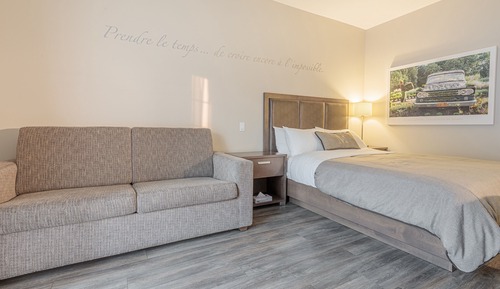 Habitación Confort, 1 cama de matrimonio con sofá cama, bañera de hidromasaje