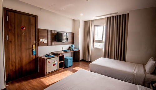 Habitación triple Deluxe
